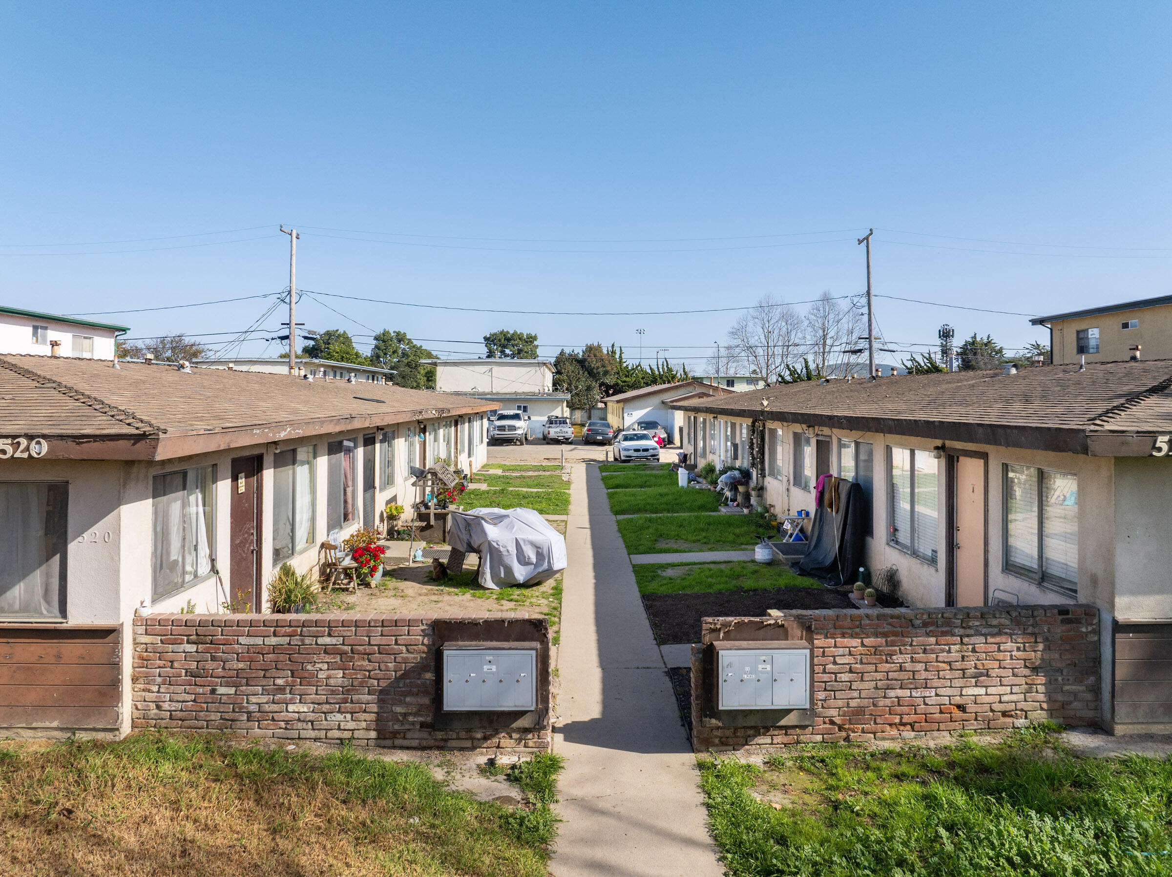 516 North U Street Lompoc, CA 93436 - Photo 7 of 8 a view of a house with a garden and balcony
