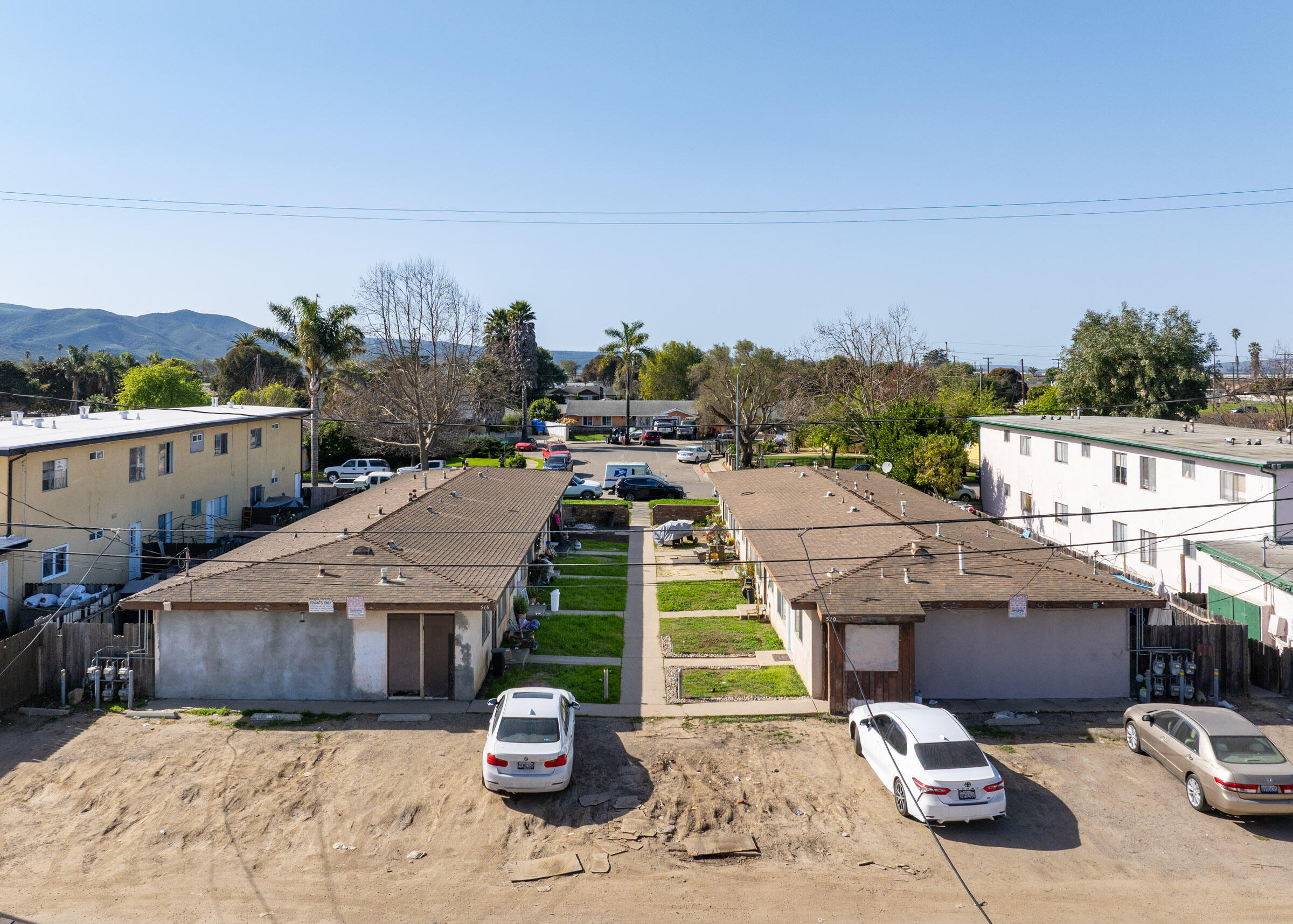 516 North U Street Lompoc, CA 93436 - Photo 8 of 8 a aerial view of a house with table and chairs