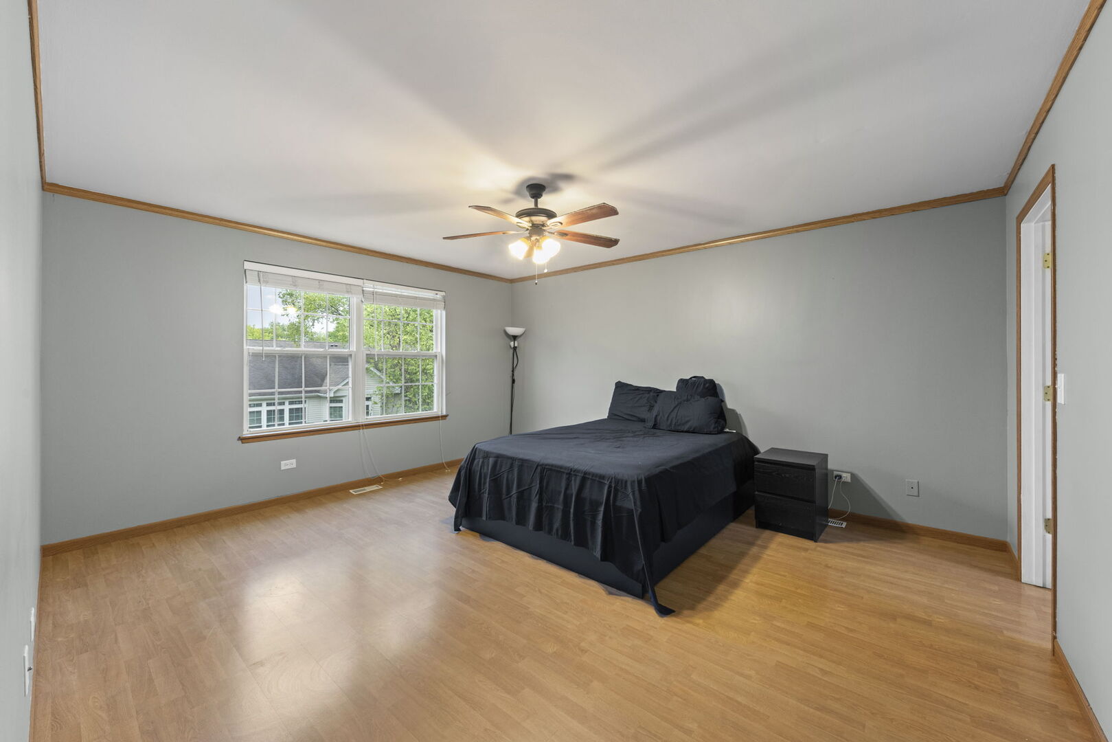 16727 South Sunset Ridge Court Lockport, IL 60441 - Photo 13 of 30 a bed room with a bed and a window