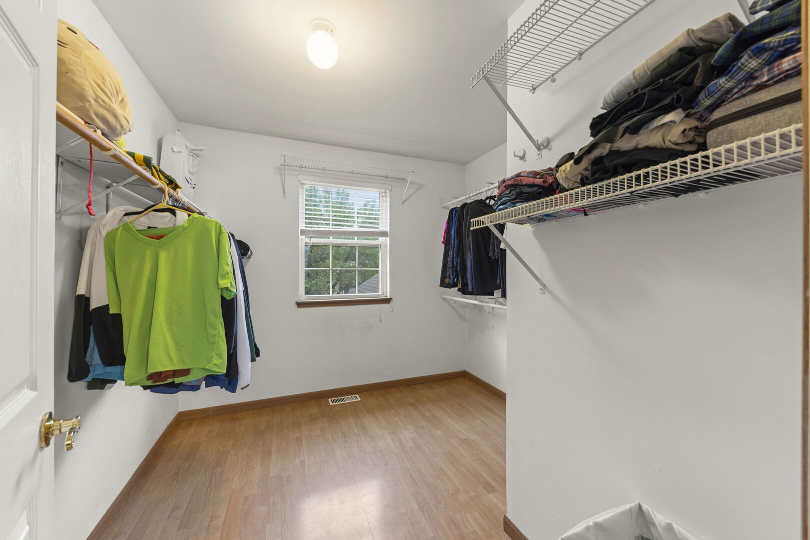 16727 South Sunset Ridge Court Lockport, IL 60441 - Photo 15 of 30 a view of walk in closet with clothes and shoes