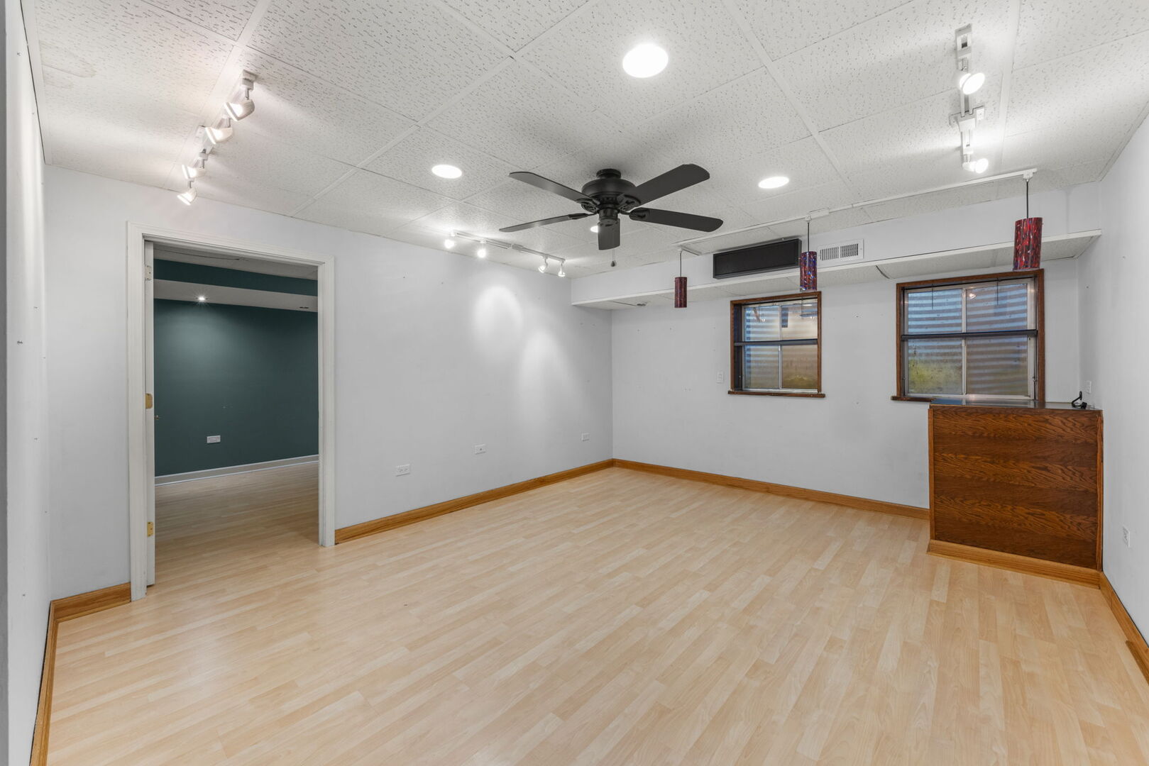 16727 South Sunset Ridge Court Lockport, IL 60441 - Photo 19 of 30 an empty room with wooden floor and windows