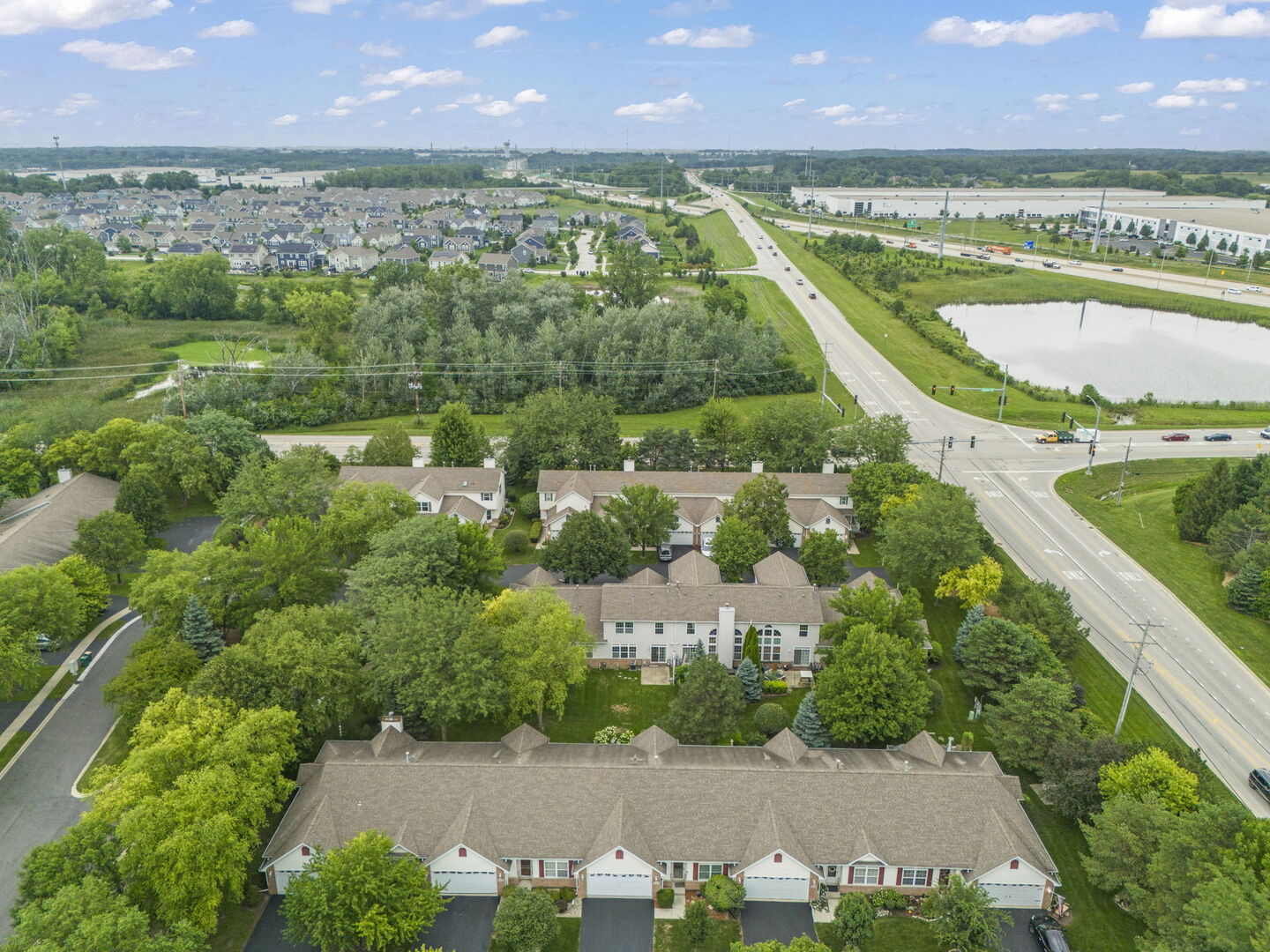 16727 South Sunset Ridge Court Lockport, IL 60441 - Photo 30 of 30 an aerial view of residential houses with outdoor space and a lake view