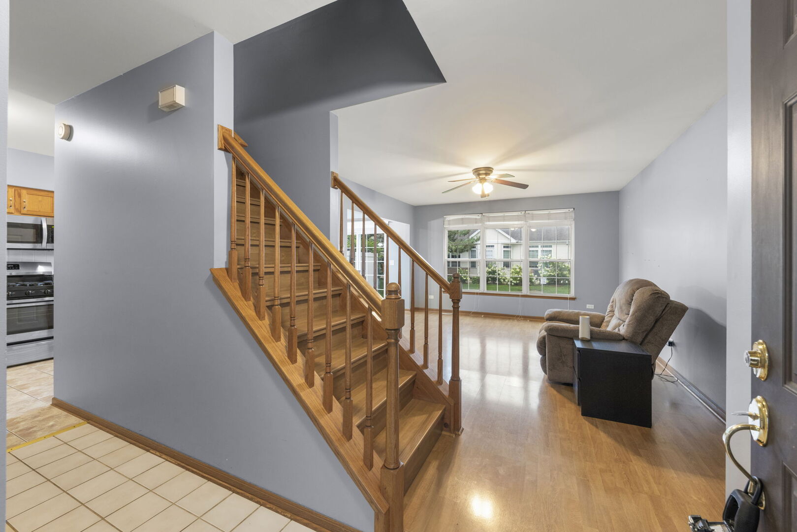 16727 South Sunset Ridge Court Lockport, IL 60441 - Photo 4 of 30 a view of staircase with furniture and stairs