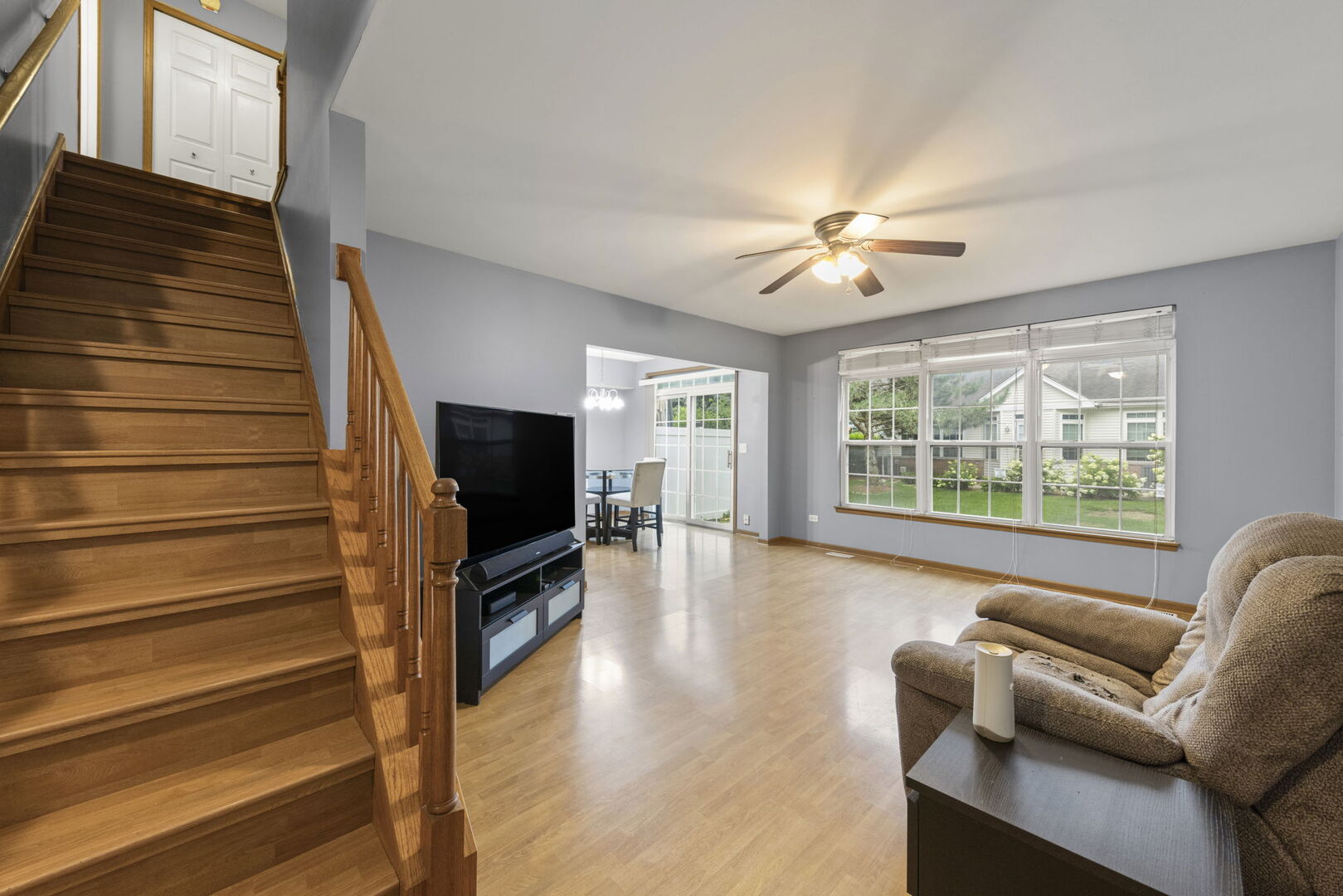 16727 South Sunset Ridge Court Lockport, IL 60441 - Photo 5 of 30 a living room with furniture and a flat screen tv
