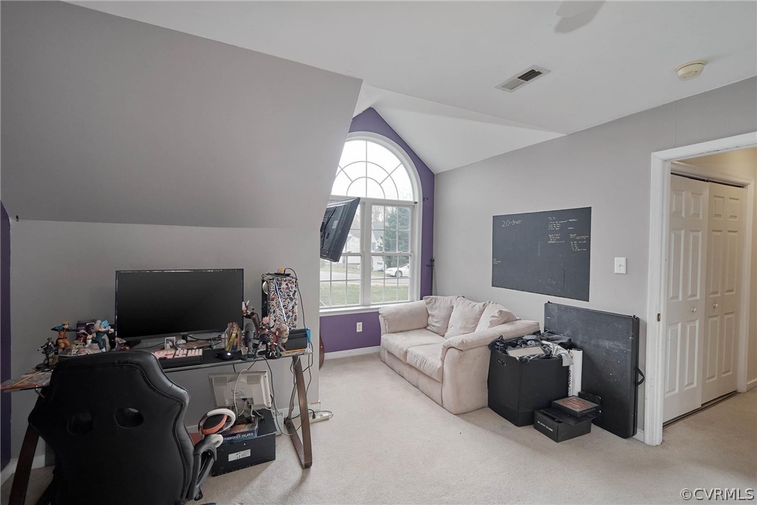 5324 Beaver Spring Road Midlothian, VA 23112 - Photo 26 of 38 a living room with furniture a flat screen tv and a large window