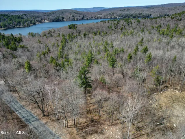 a view of a backyard of the house