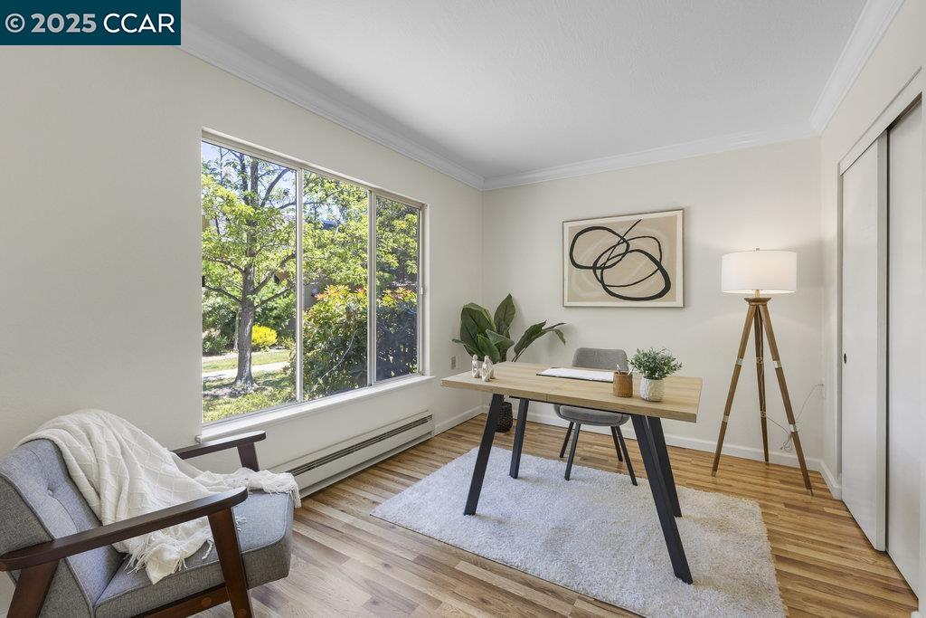 1833 Skycrest Drive, Unit 2 Walnut Creek, CA 94595 - Photo 16 of 28 a living room with furniture and a window