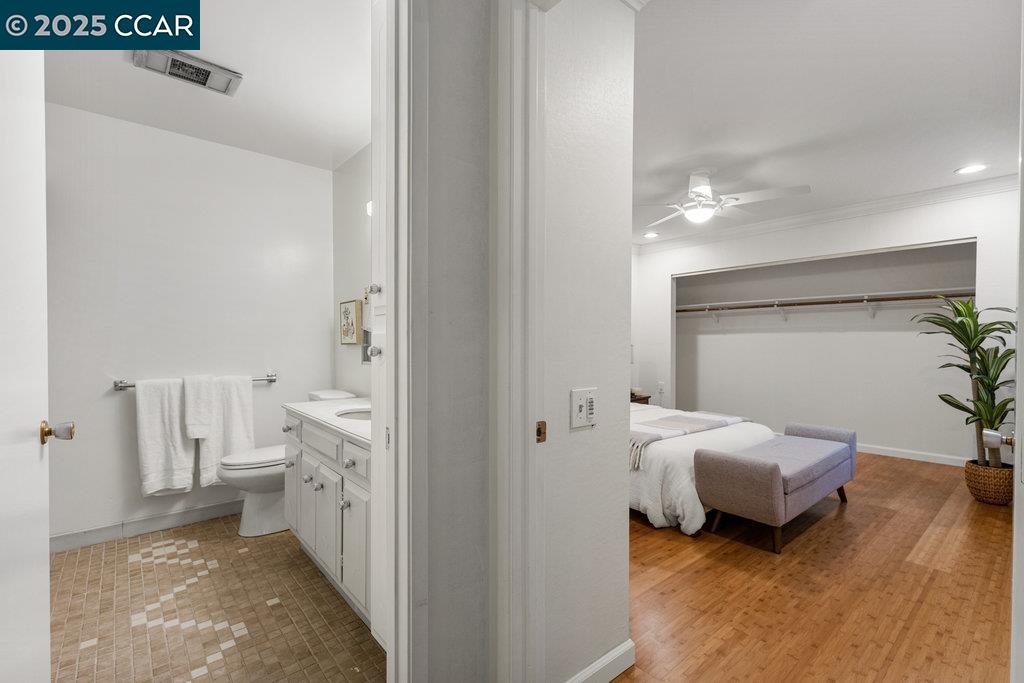 1833 Skycrest Drive, Unit 2 Walnut Creek, CA 94595 - Photo 20 of 28 a room with a bed and a view of bedroom