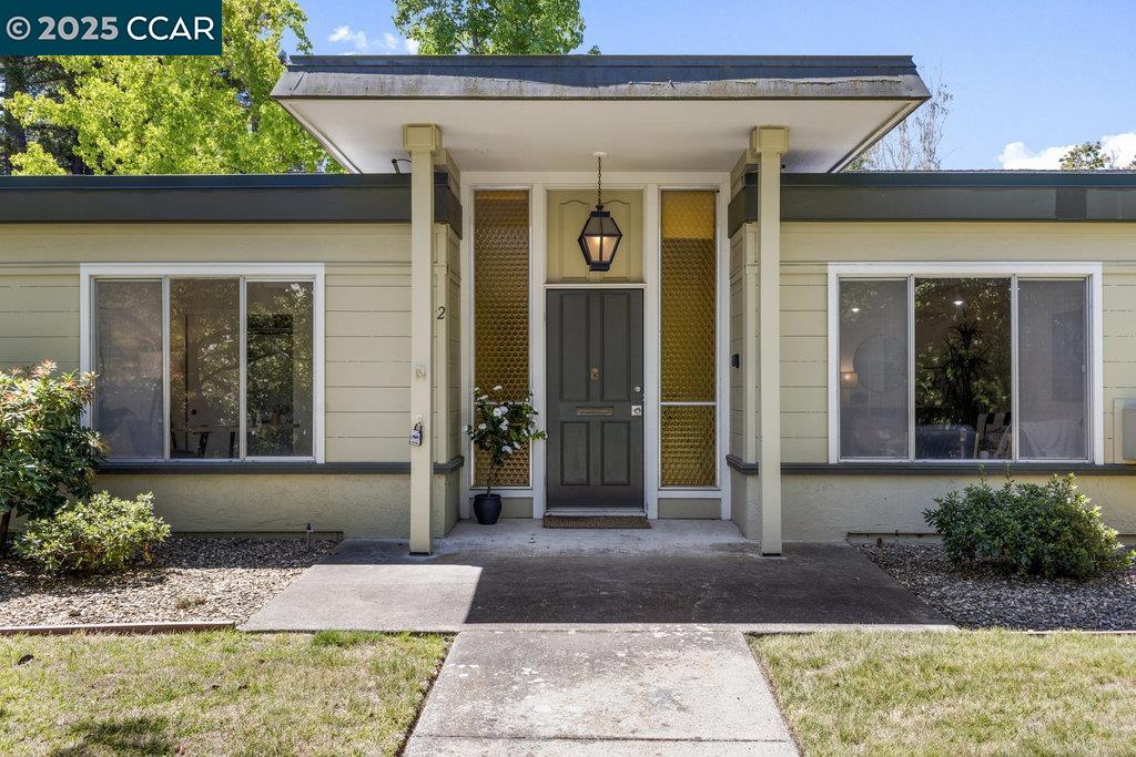 1833 Skycrest Drive, Unit 2 Walnut Creek, CA 94595 - Photo 2 of 28 a front view of a house