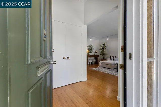 a view of a bedroom from a hallway