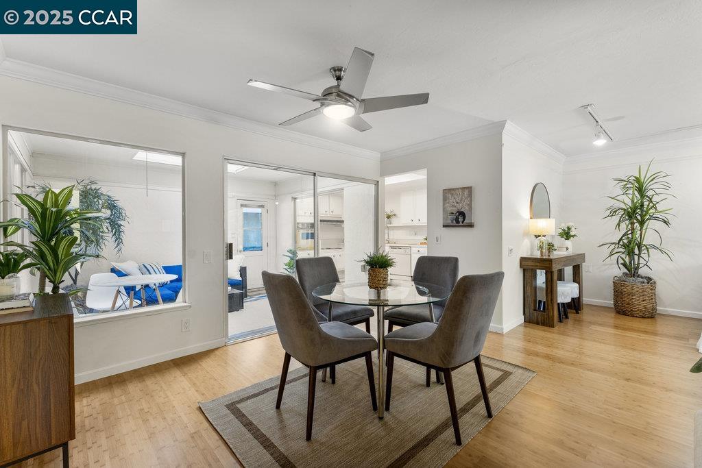 1833 Skycrest Drive, Unit 2 Walnut Creek, CA 94595 - Photo 10 of 28 a view of a livingroom with furniture and a potted plant