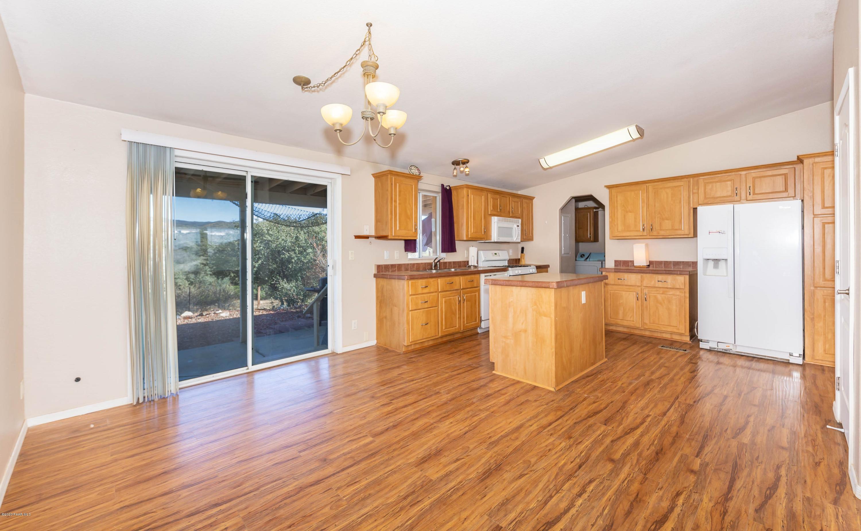 980 North Ambassador Road Dewey, AZ 86327 - Photo 5 of 28 Dining Area w/Patio Access