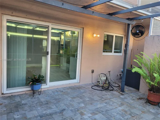 a view of a porch with seating space