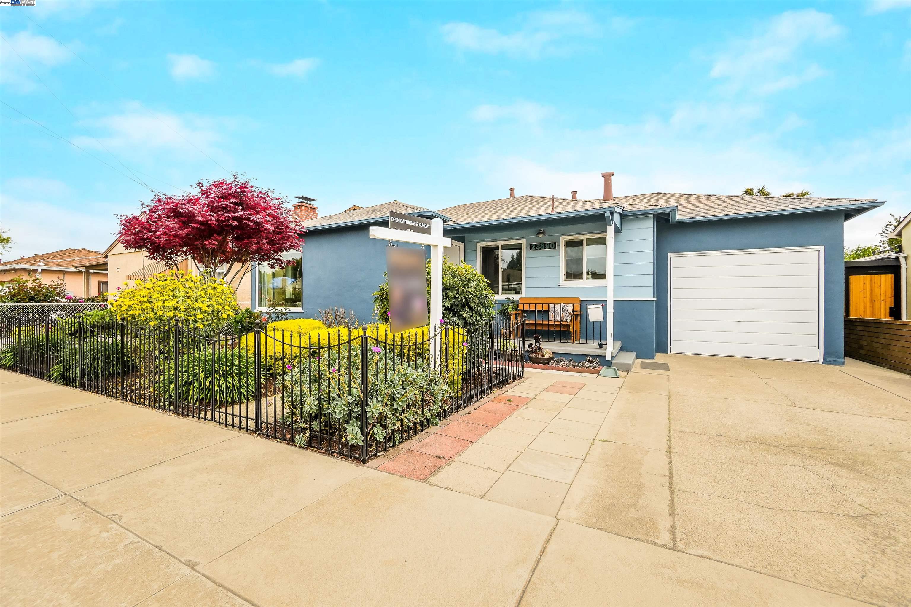 a house view with a garden space