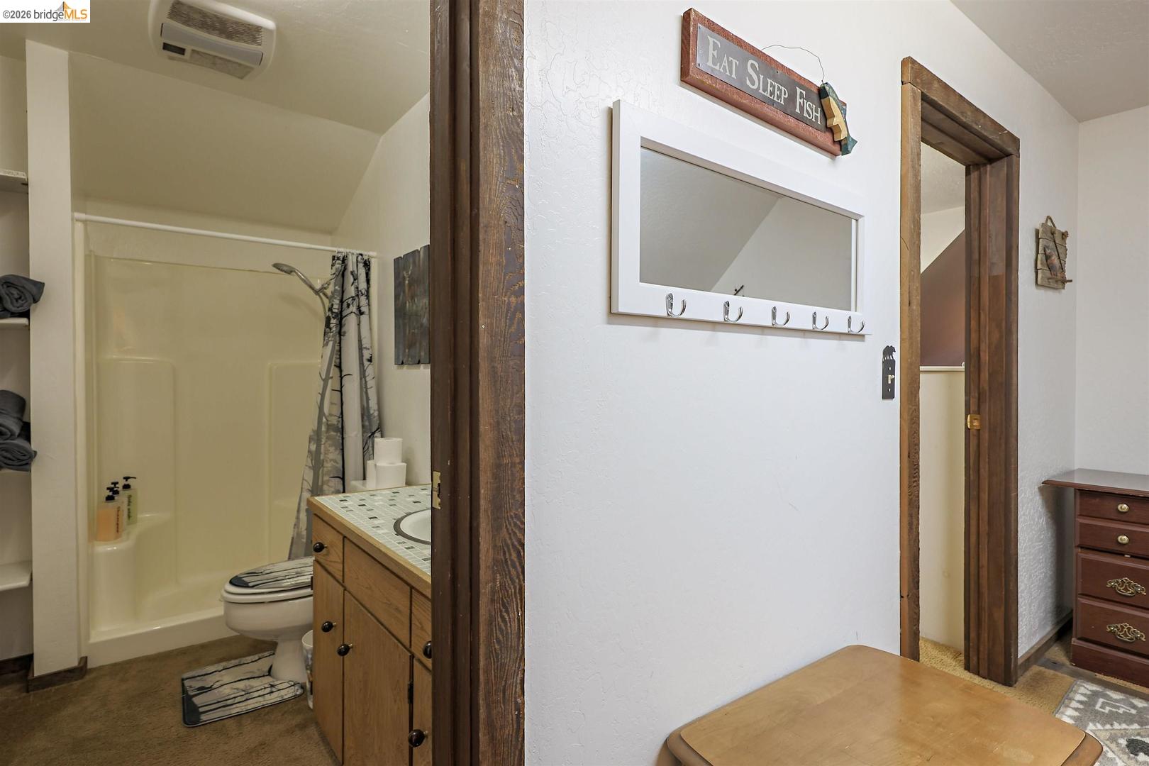 26600 Inyo Drive Cold Springs, CA 95335 - Photo 28 of 38 a bathroom with a toilet sink and shower