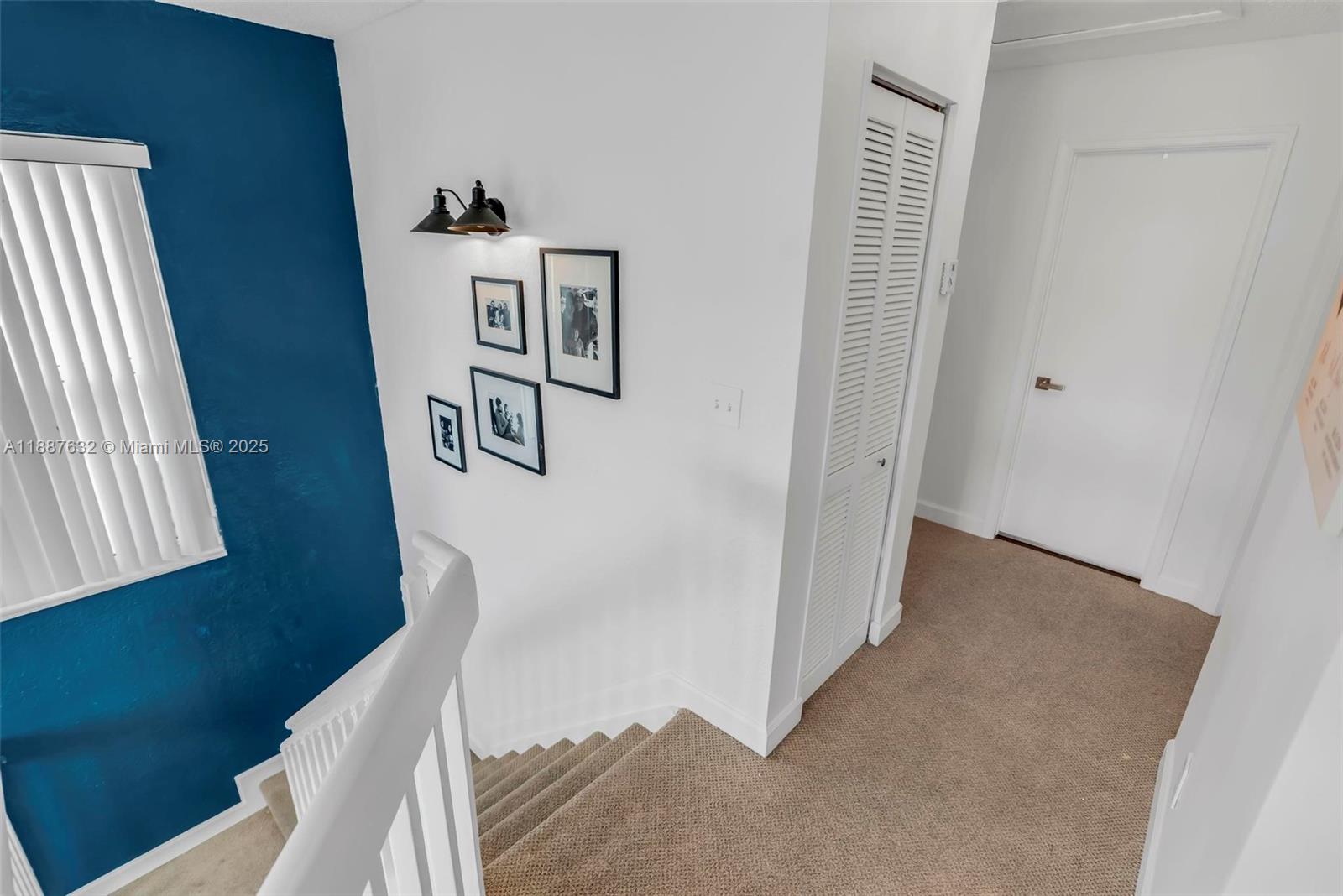 14836 Southwest 51st Street Davie, FL 33331 - Photo 23 of 34 a view of a hallway with workspace