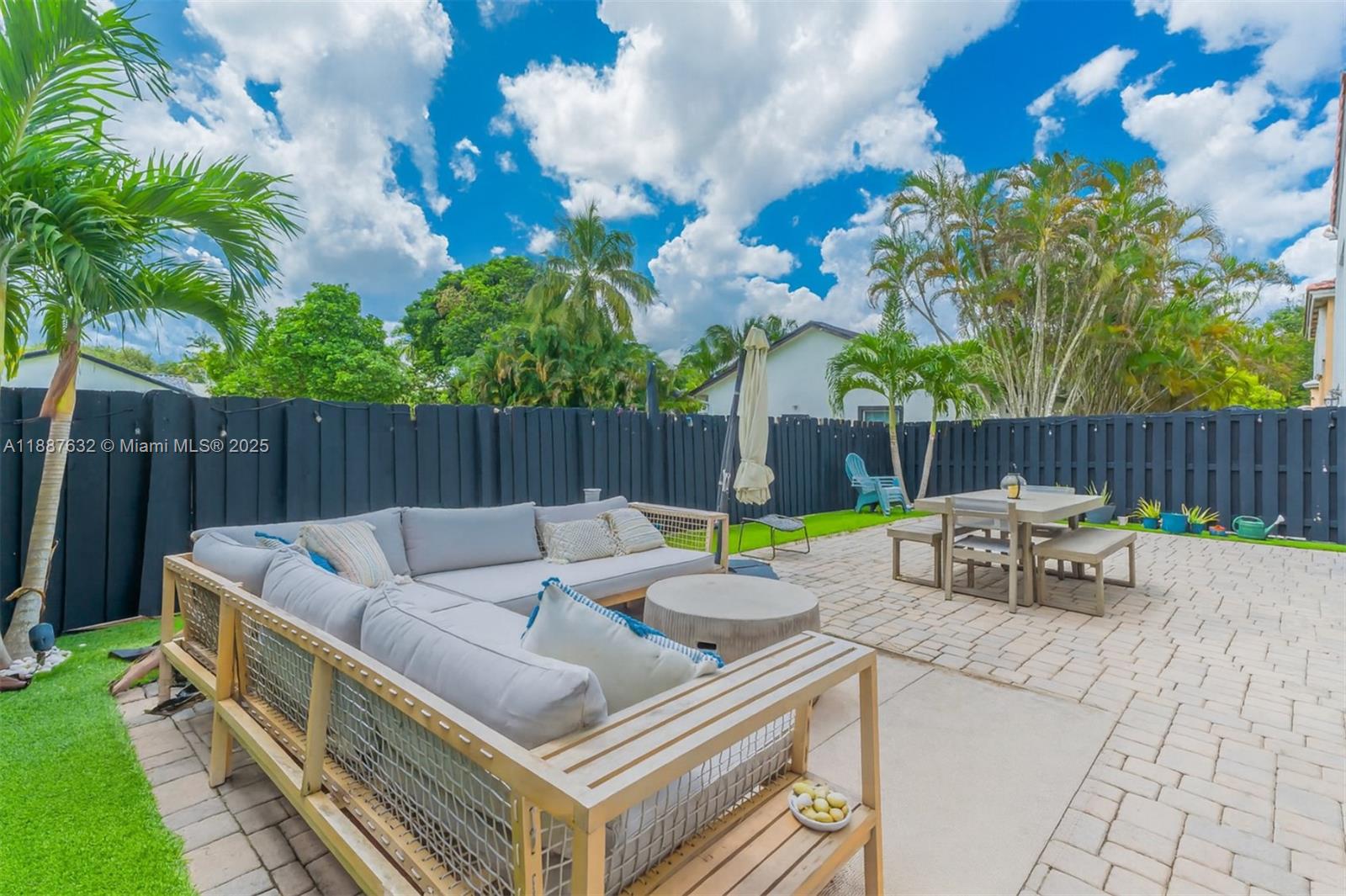 14836 Southwest 51st Street Davie, FL 33331 - Photo 25 of 34 a view of an outdoor sitting area with furniture