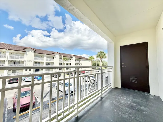 a view of balcony with furniture