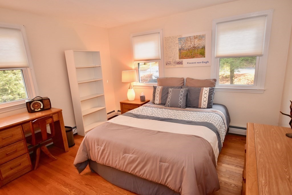 227 Heatherstone Road Amherst, MA 01002 - Photo 26 of 42 a bedroom with a bed and a window