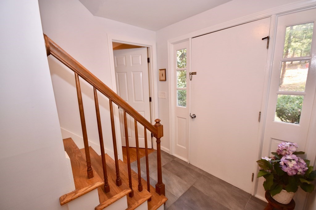 227 Heatherstone Road Amherst, MA 01002 - Photo 3 of 42 a view of entryway with wooden floor