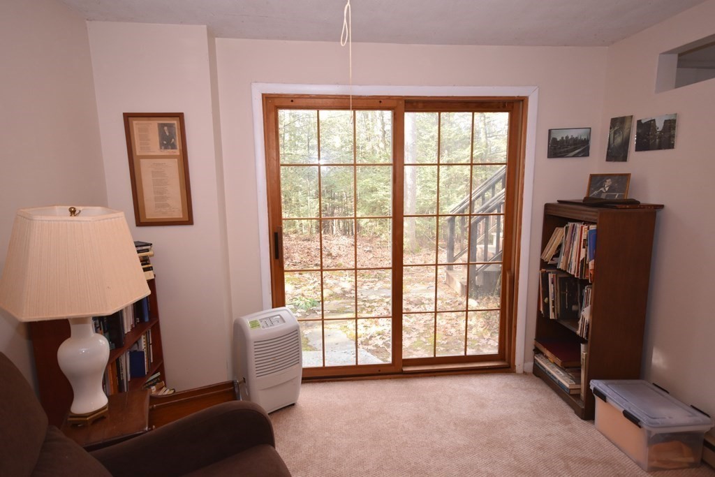227 Heatherstone Road Amherst, MA 01002 - Photo 34 of 42 a view of an empty room with a window