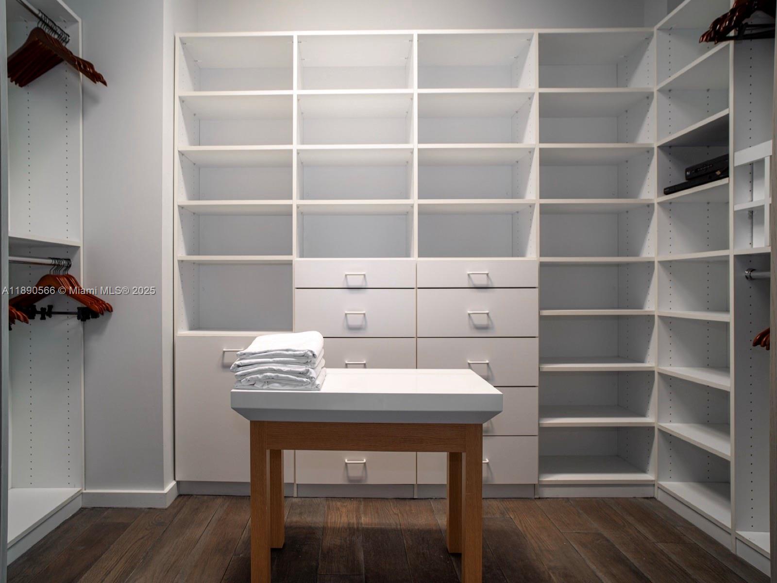 900 Brickell Key Boulevard, Unit 2204 Miami, FL 33131 - Photo 14 of 40 a view of a workspace with furniture