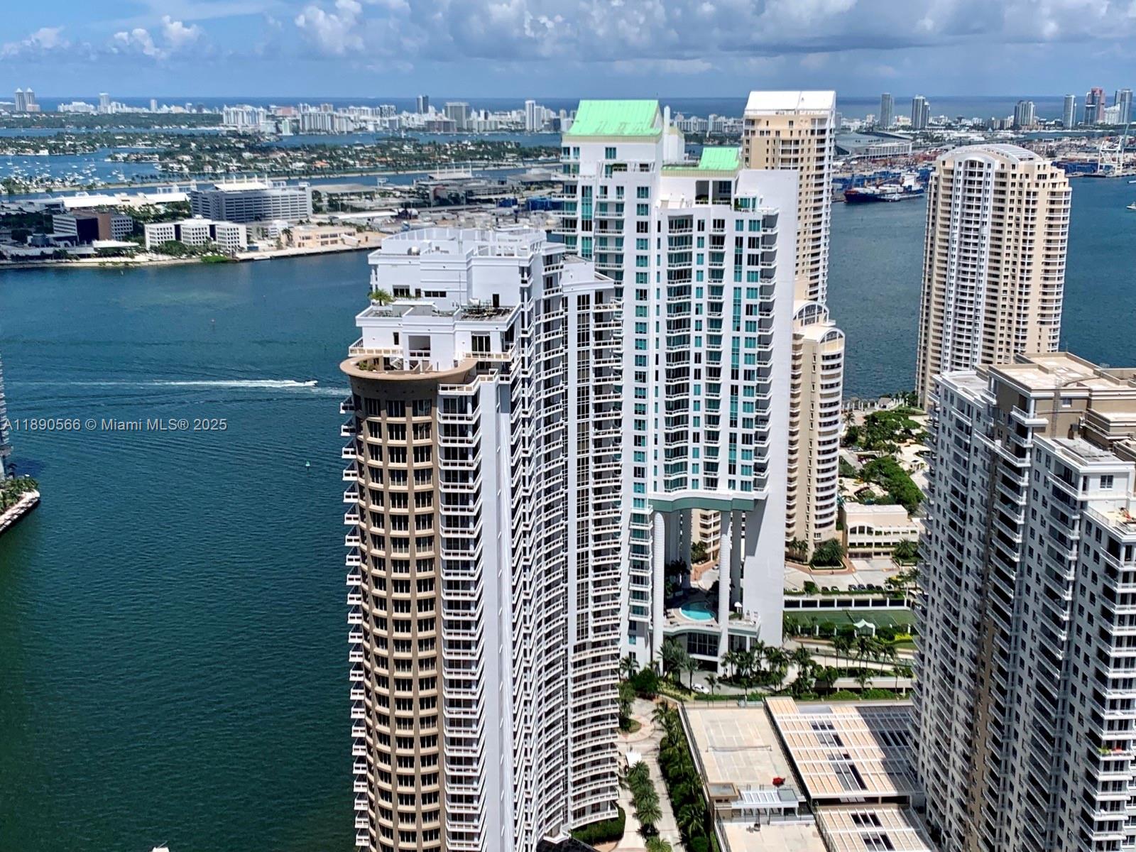 900 Brickell Key Boulevard, Unit 2204 Miami, FL 33131 - Photo 25 of 40 a view of a city with tall buildings