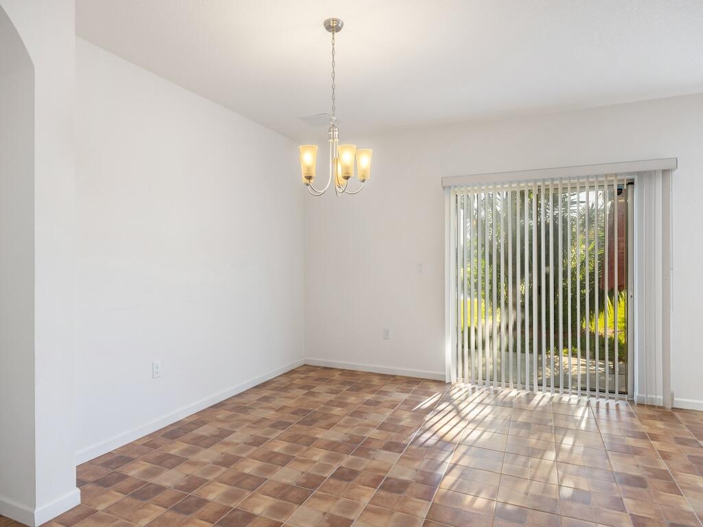 1440 Lexington Square Southwest Vero Beach, FL 32962 - Photo 11 of 41 a view of an empty room with a window