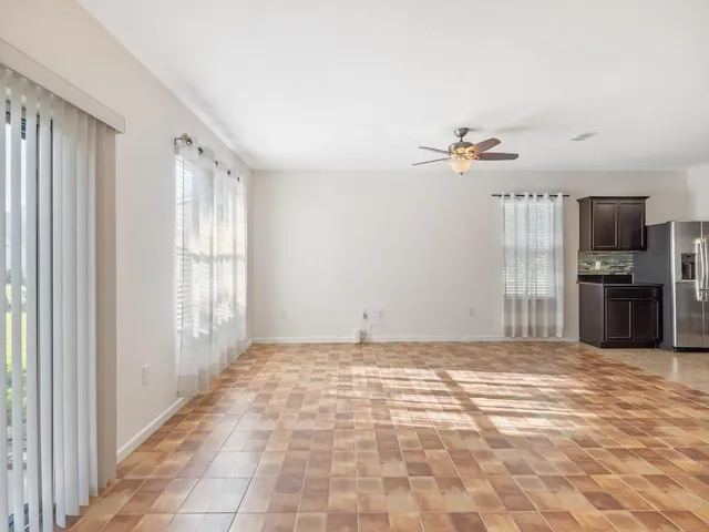 a view of a livingroom with a staircase