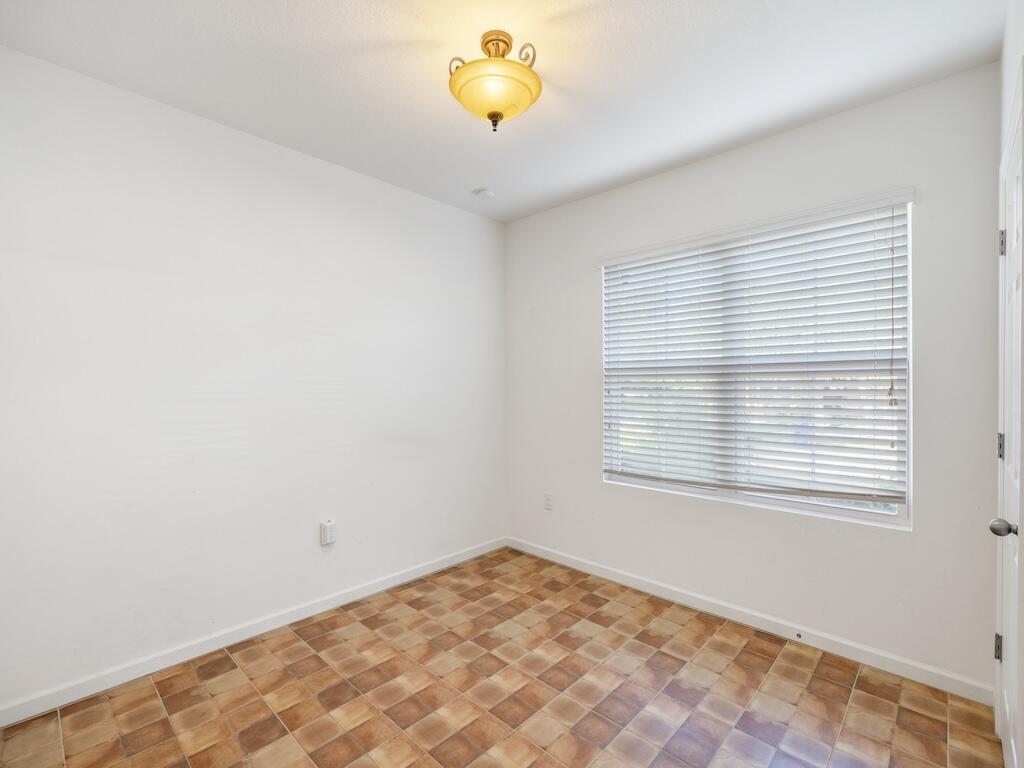1440 Lexington Square Southwest Vero Beach, FL 32962 - Photo 16 of 41 a view of a room with a window