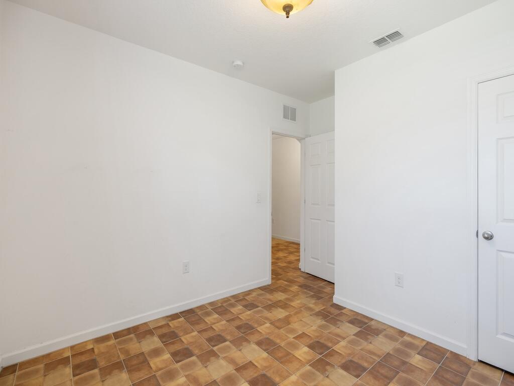 1440 Lexington Square Southwest Vero Beach, FL 32962 - Photo 19 of 41 a view of an empty room