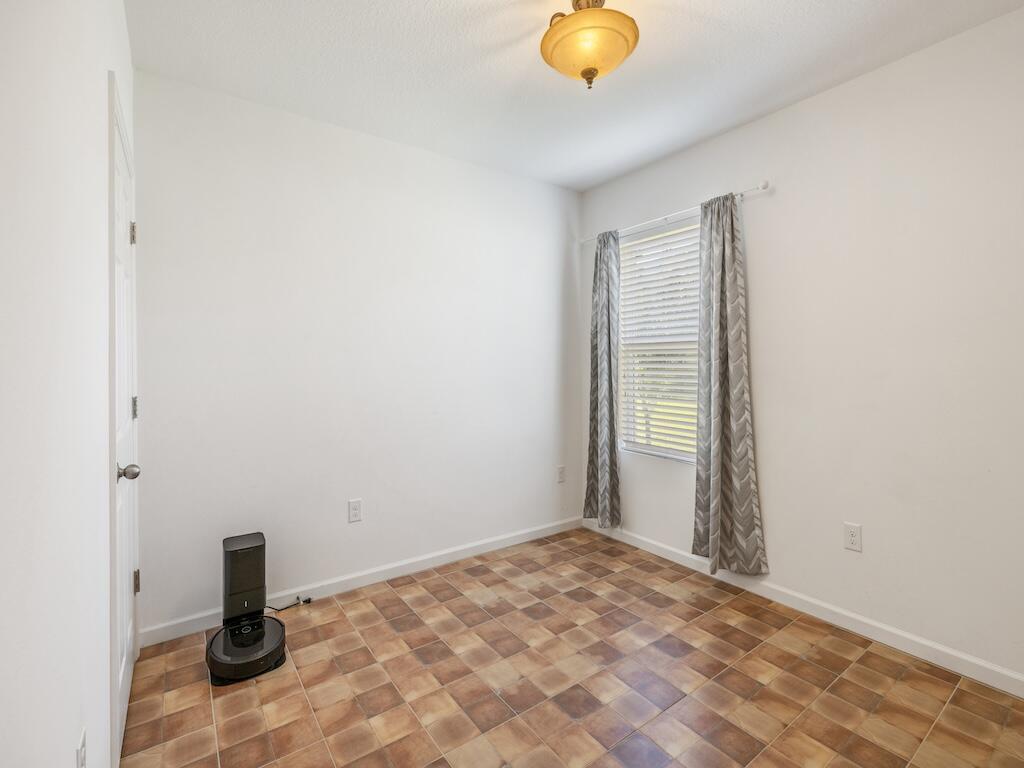 1440 Lexington Square Southwest Vero Beach, FL 32962 - Photo 20 of 41 a view of a room with a kitchen