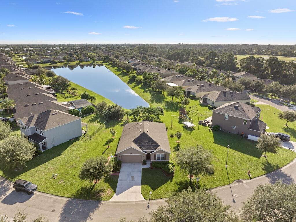 1440 Lexington Square Southwest Vero Beach, FL 32962 - Photo 33 of 41 an aerial view of residential houses with outdoor space