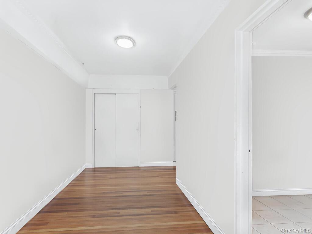 1475 Thieriot Avenue, Unit 5N Bronx, NY 10460 - Photo 4 of 22 a view of a hallway