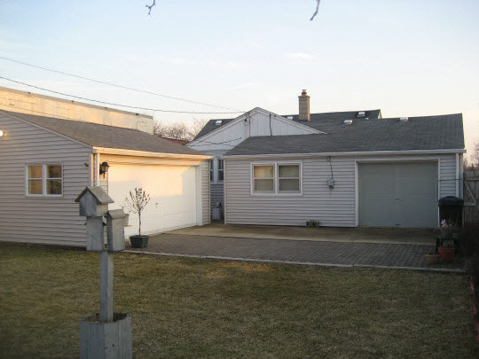 822 Windsor Road Loves Park, IL 61111 - Photo 6 of 10 a front view of a house with garden