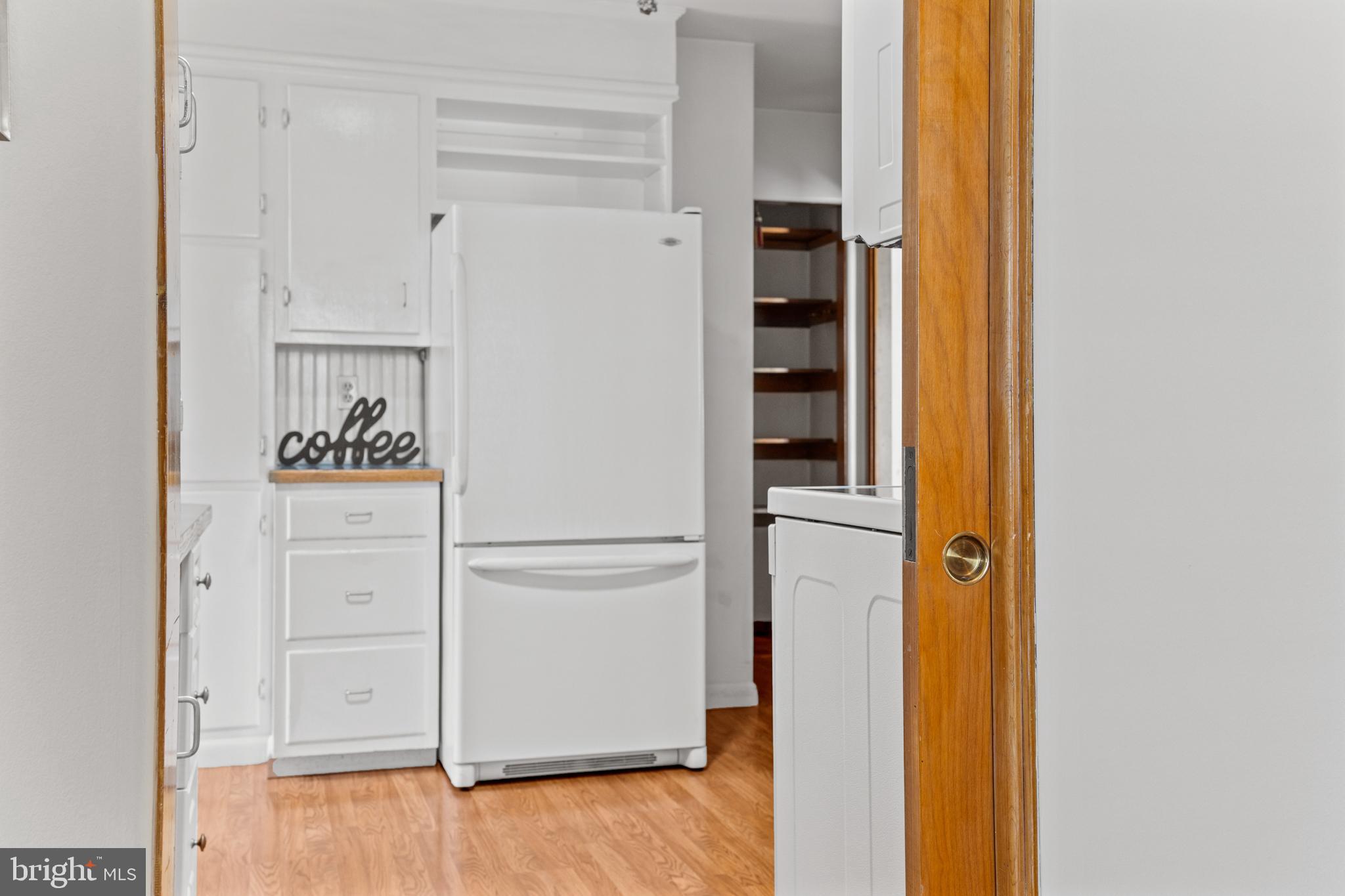 274 Beverly Road Newark, DE 19711 - Photo 10 of 40 Kitchen with Pocket Door to Dining Room