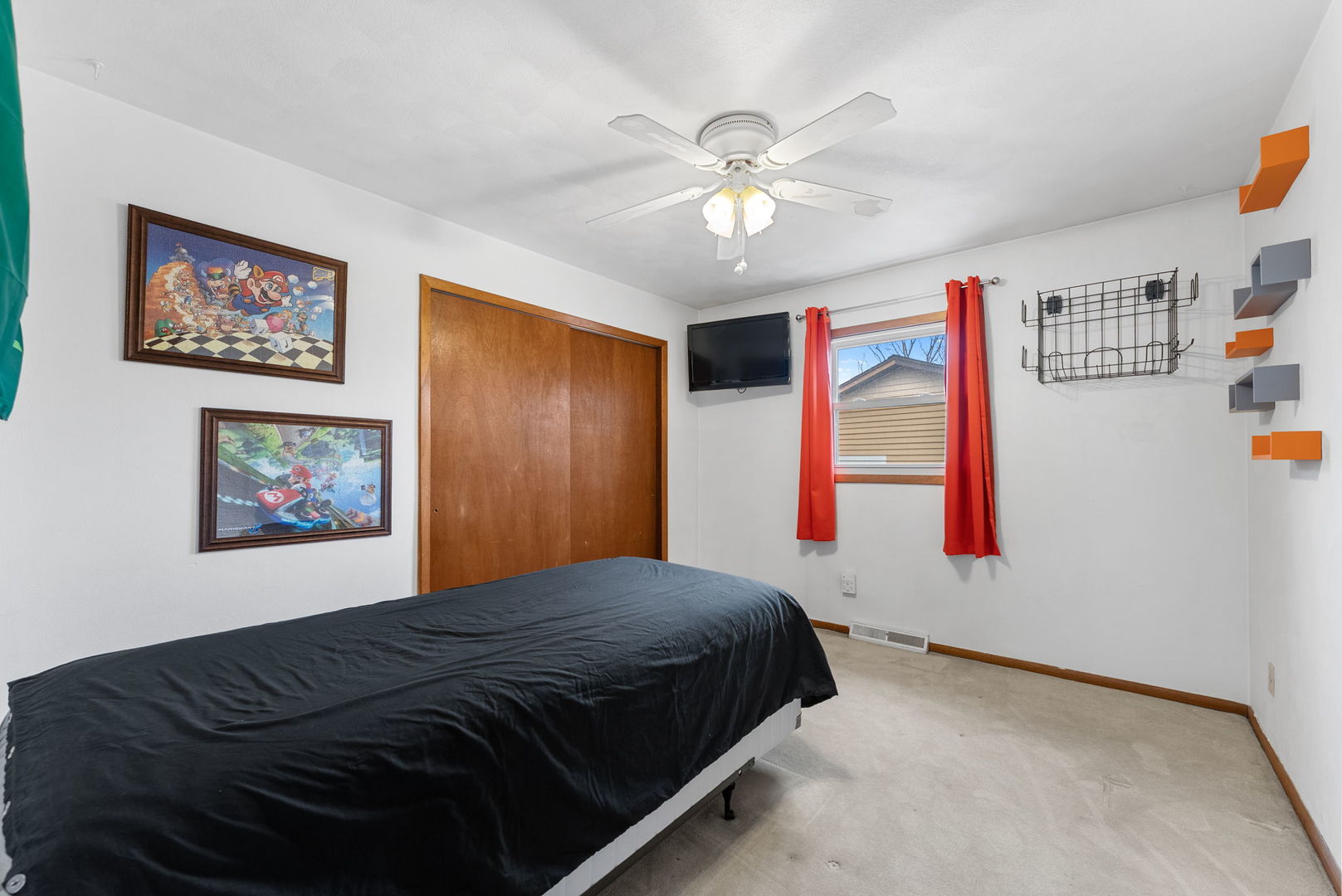 110 Andrea Court Cleveland, IL 61241 - Photo 17 of 23 a bedroom with a bed and a chandelier