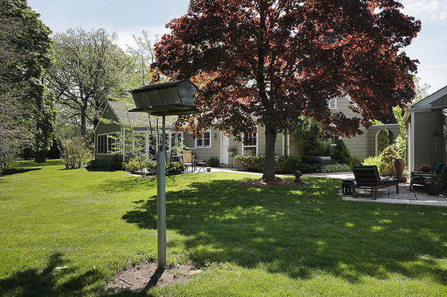 1105 Longmeadow Road Northbrook, IL 60062 - Photo 24 of 24 a backyard of a house with table and chairs