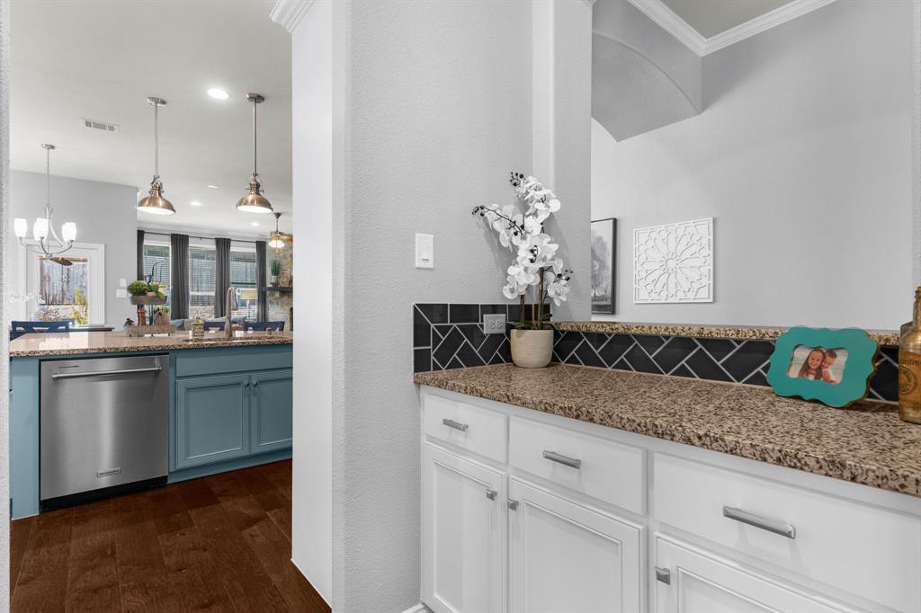 5604 Datewood Lane McKinney, TX 75071 - Photo 13 of 40 a spacious bathroom with a granite countertop sink and a mirror