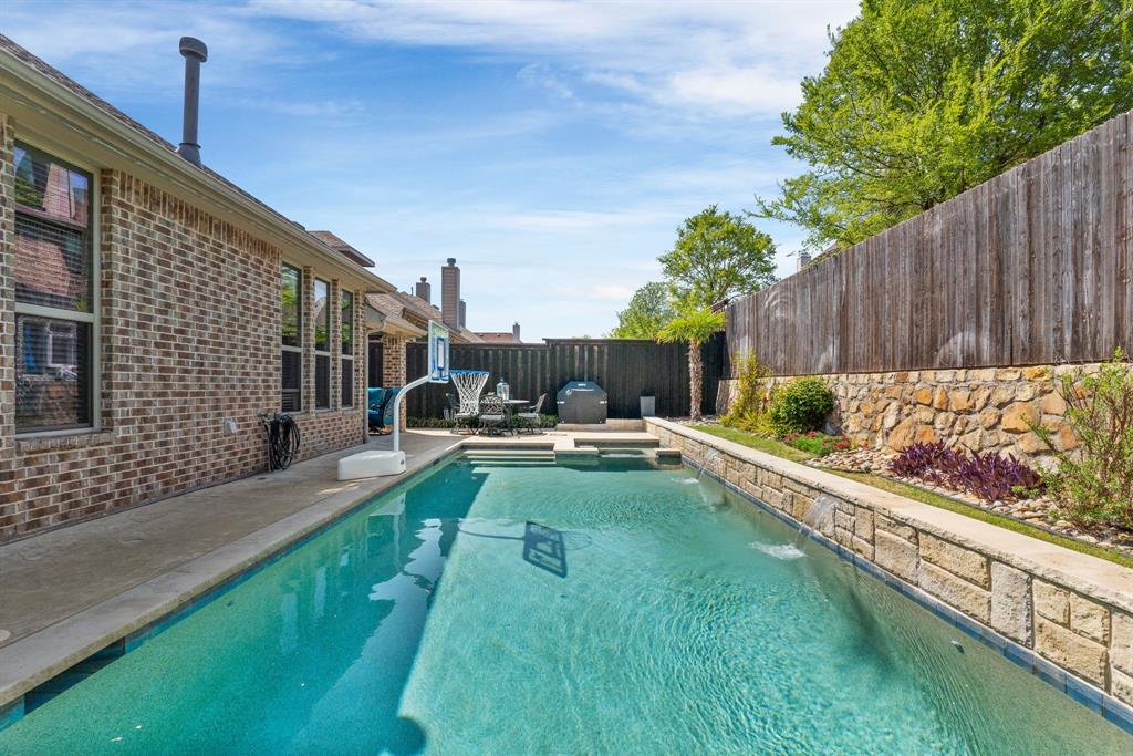 5604 Datewood Lane McKinney, TX 75071 - Photo 32 of 40 a view of a backyard with sitting area