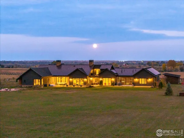 a view of a house with a big yard