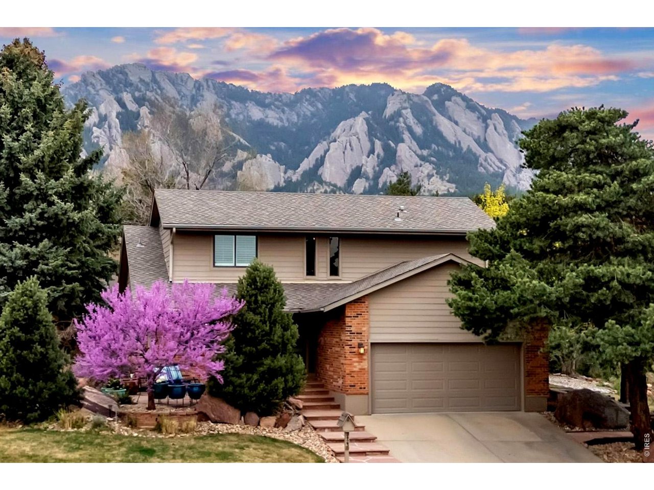 2423 Powderhorn Lane Boulder, CO 80305 - Photo 1 of 50 a front view of house with mountain view