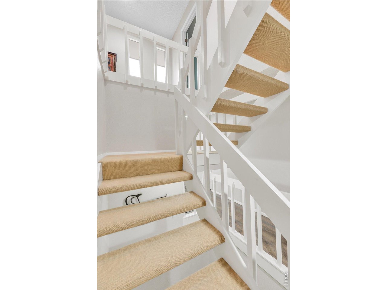 2423 Powderhorn Lane Boulder, CO 80305 - Photo 29 of 50 a view of a hallway with staircase