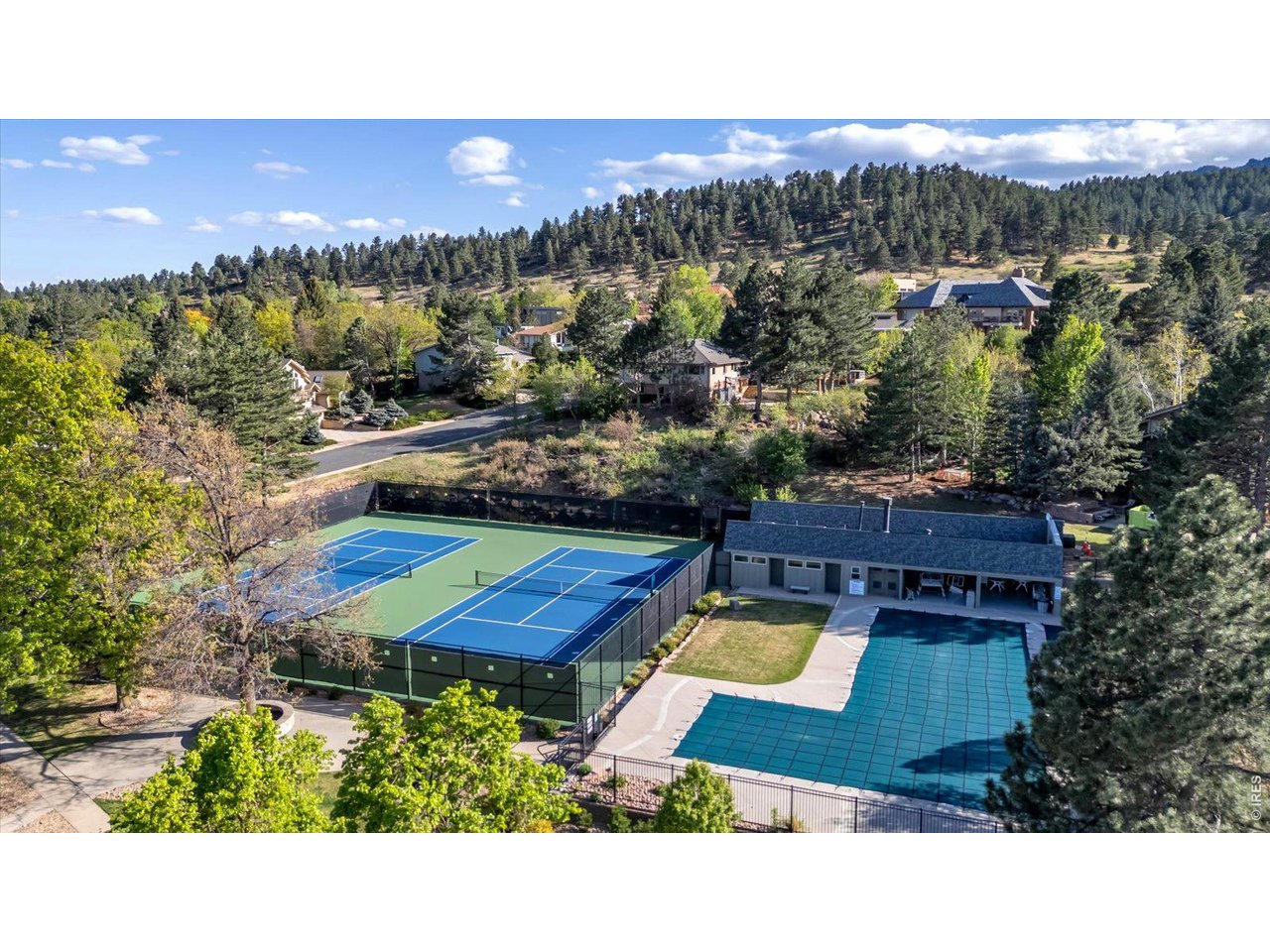 2423 Powderhorn Lane Boulder, CO 80305 - Photo 48 of 50 a aerial view of a house with a swimming pool yard and mountain view