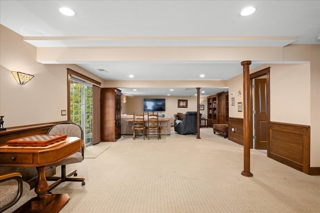 7 Primmett Lane, Unit 7 Worcester, MA 01609 - Photo 29 of 38 a view of a livingroom with furniture and a couch