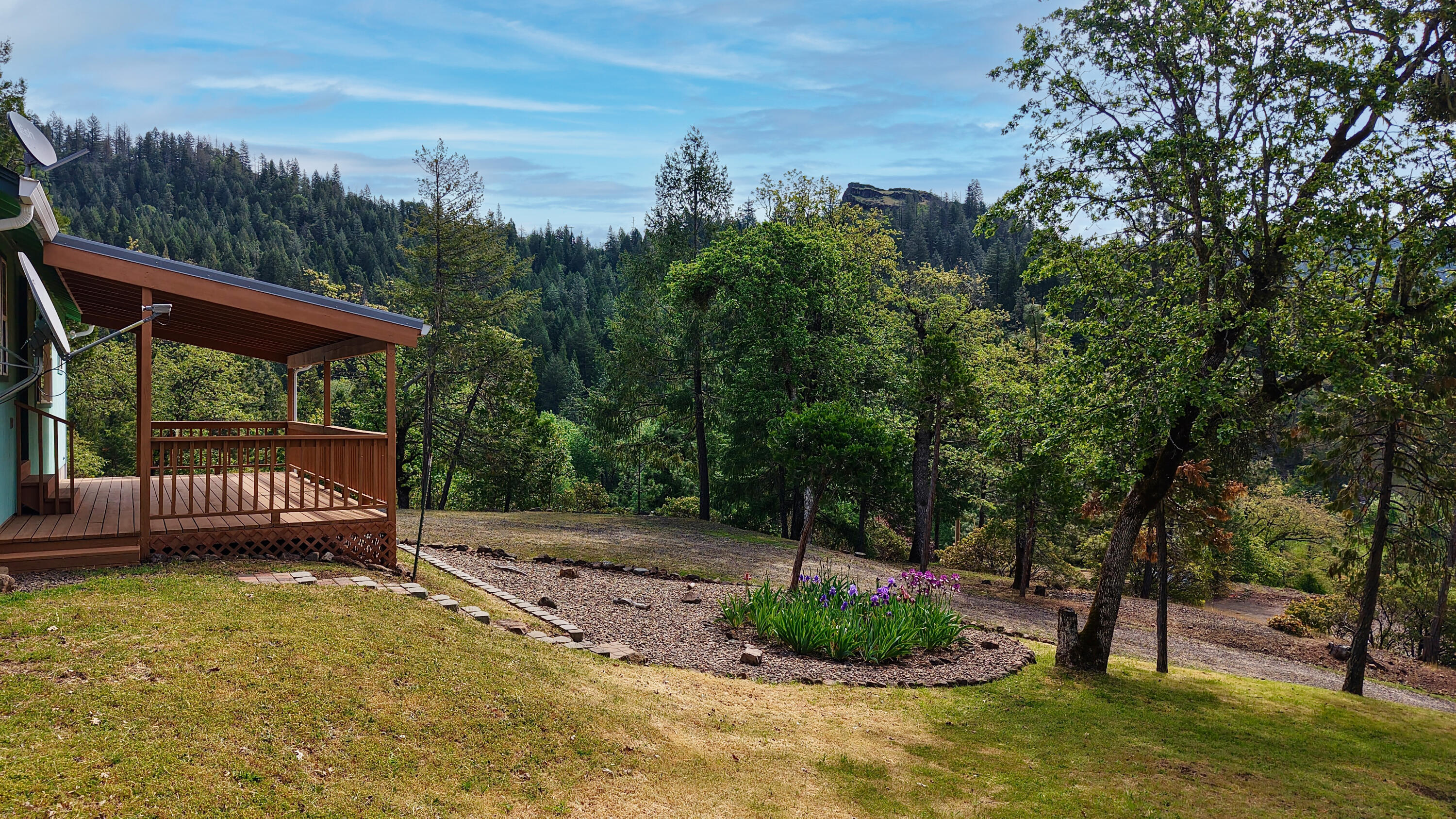 204 Shipley Terrace Prospect, OR 97536 - Photo 52 of 61 a view of a backyard with a small cabin
