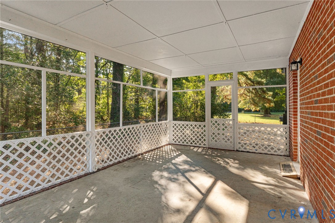 310 East Gwynnfield Road Tappahannock, VA 22560 - Photo 19 of 27 Screen Porch with a peek of the River. A must for
