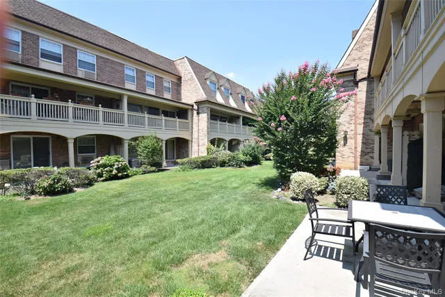a house view with a garden space