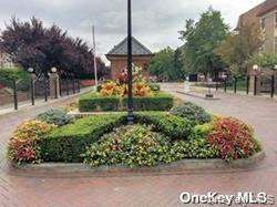 12-36 Estates Lane, Unit 49L Queens, NY 11360 - Photo 28 of 37 a view of a park with iron fence
