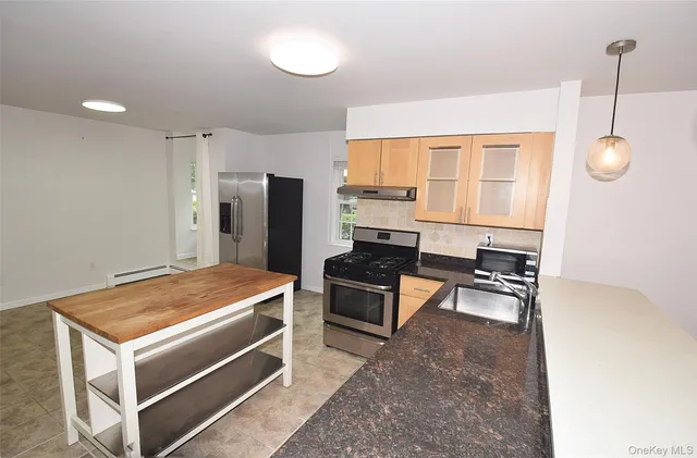 a room with furniture and window